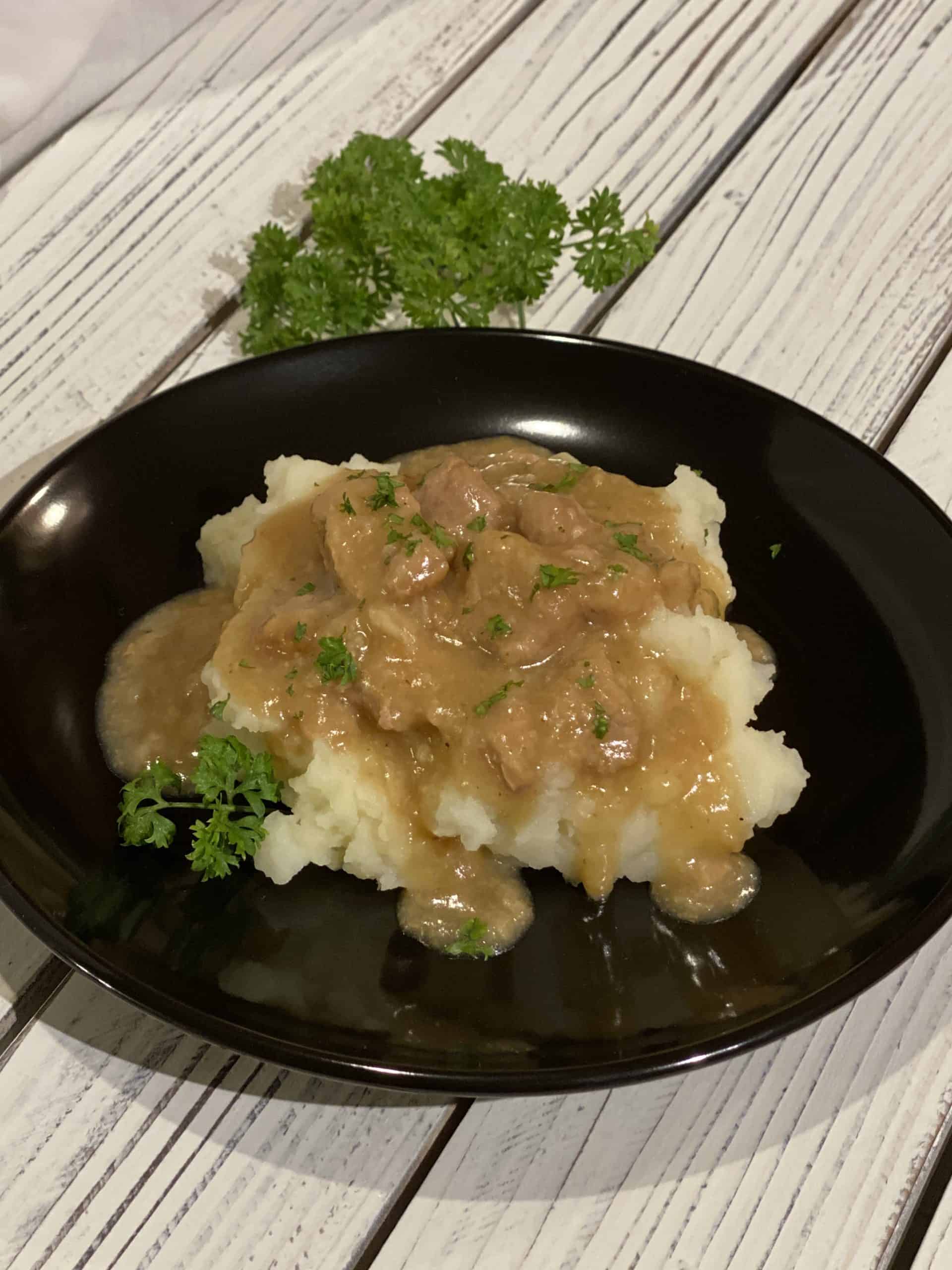 Tender Pork with Mashed Potatoes and Gravy