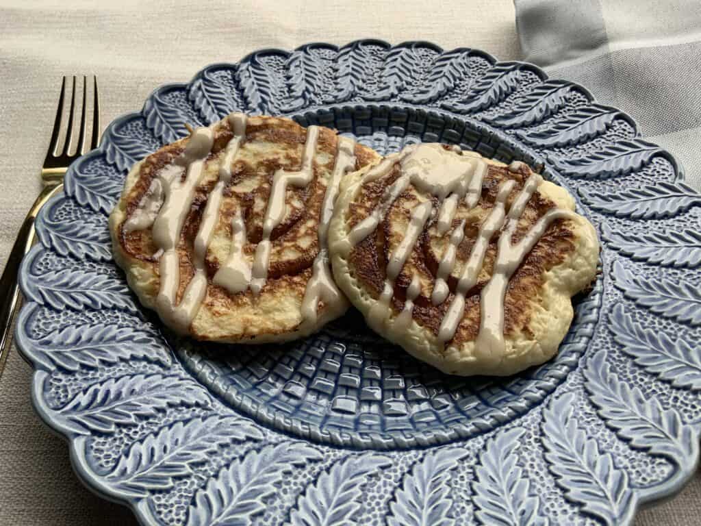 Cinnamon Roll Pancakes on a plate.