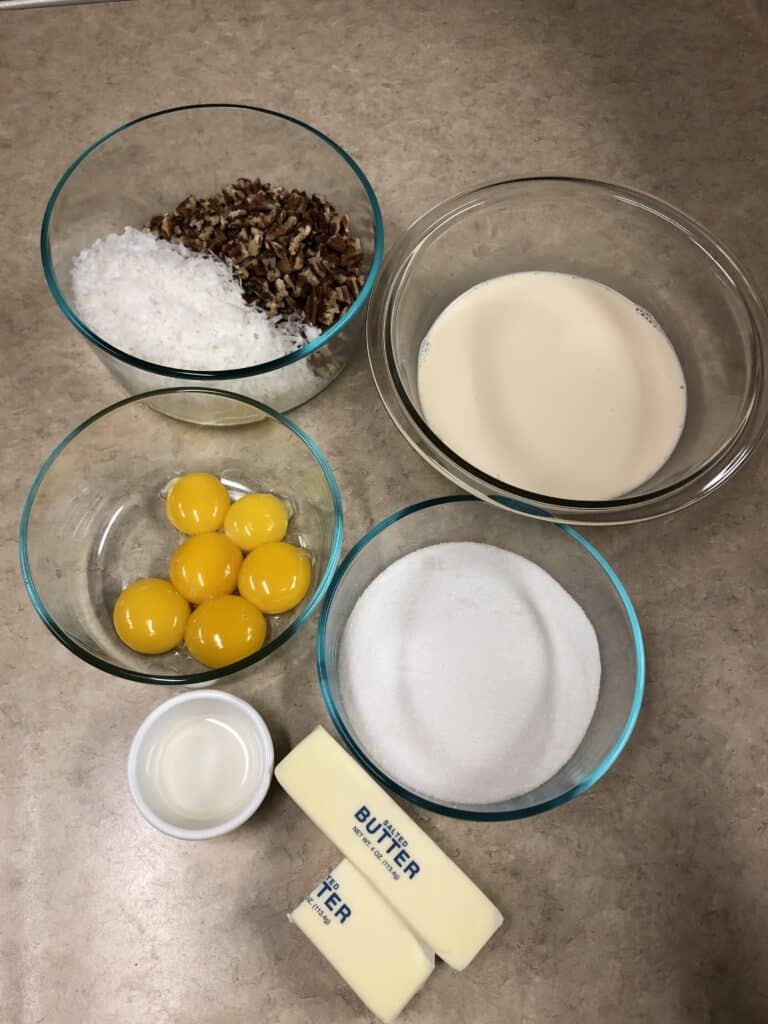 Frosting Ingredients - Butter, Evaporated Milk, Granulated Sugar, Egg Yolks, Coconut, Pecan Pieces and Vanilla