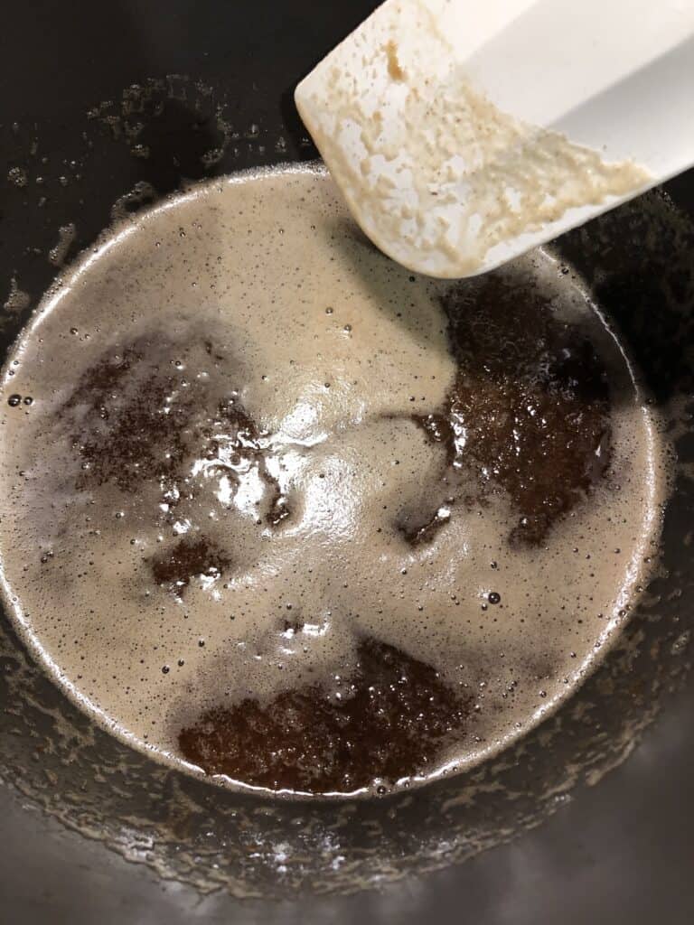 Brown butter/sugar mixture in a saucepan.
