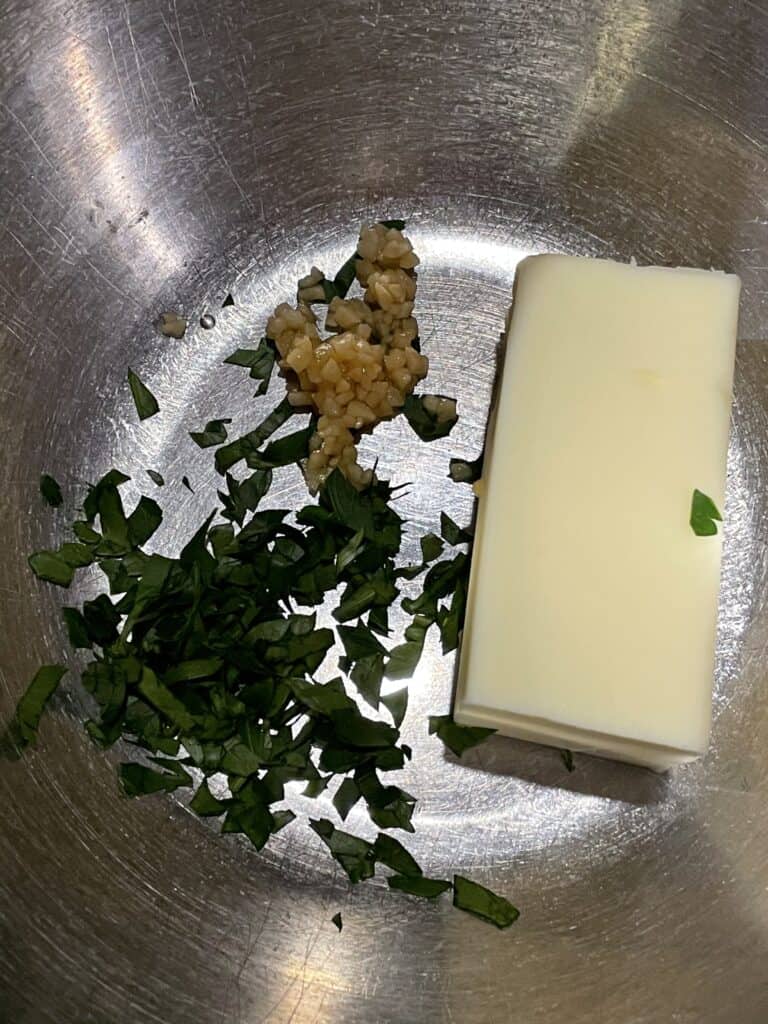 Garlic Parsley Butter Ingredients in a bowl.