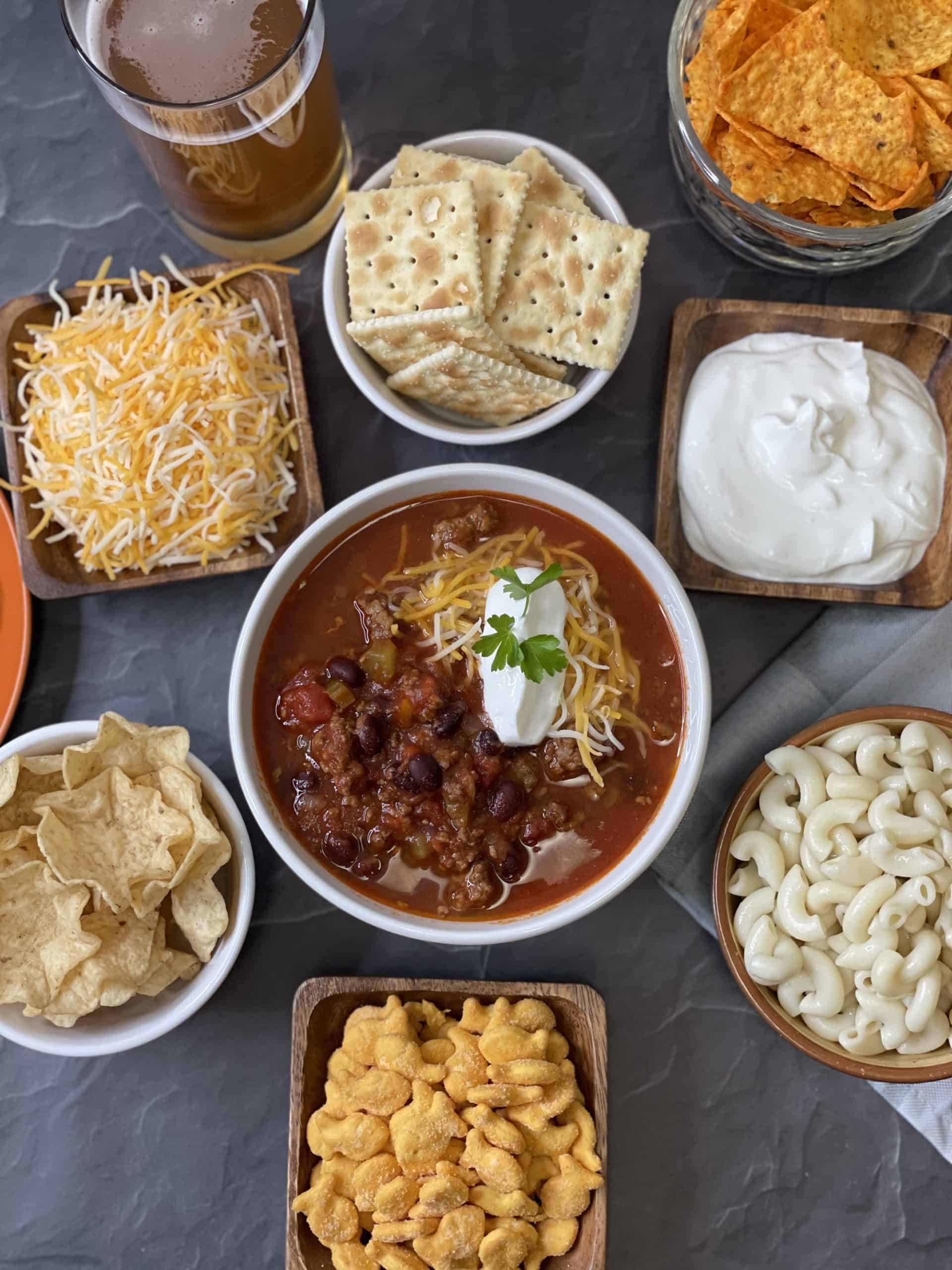 Venison Chili Bar - Chili, Sour Cream, Shredded Cheese, Saltine Crackers, Cooked Noodles, Tortilla Chips, & Gold Fish Crackers