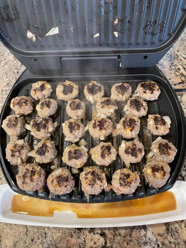 Browning meatballs on George Forman Griddle.