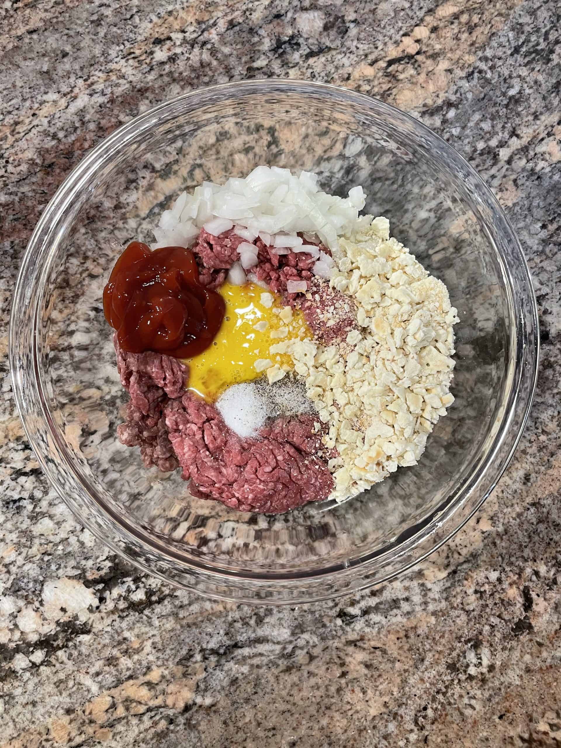 Combine the Hamburger, egg, diced onion, crushed crackers, ketchup, 1/2 the salt and pepper.