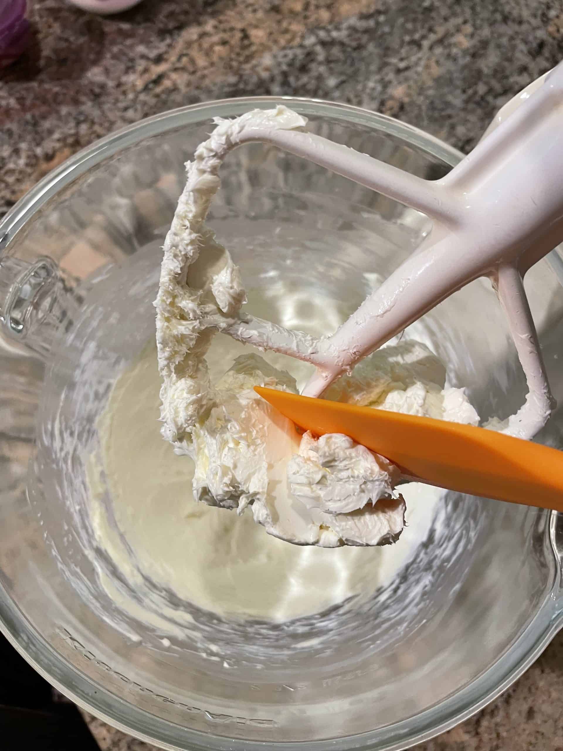 Beating the cream cheese with a stand mixer and flat paddle.