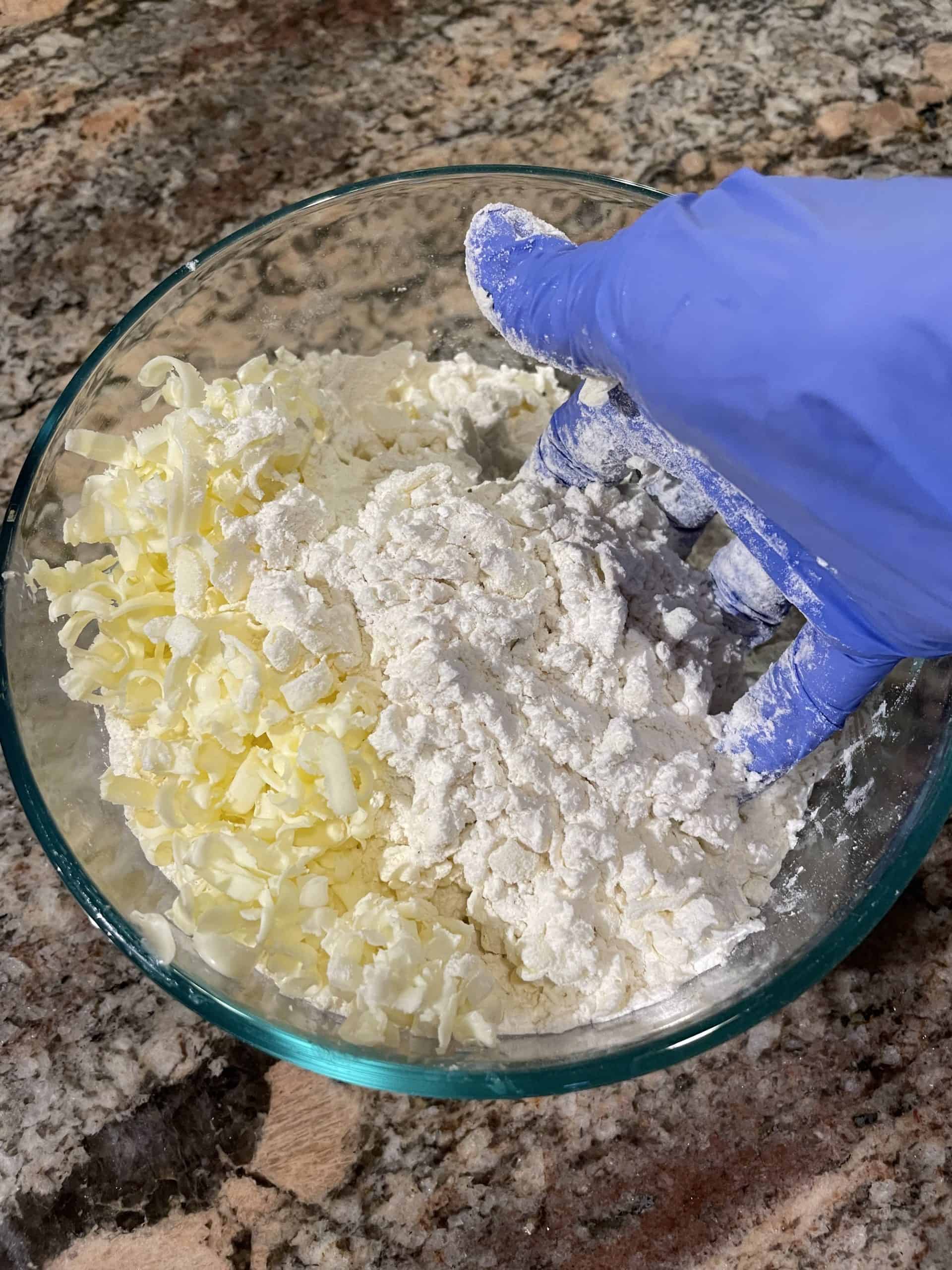 Combine the grated butter into the flour mixture.