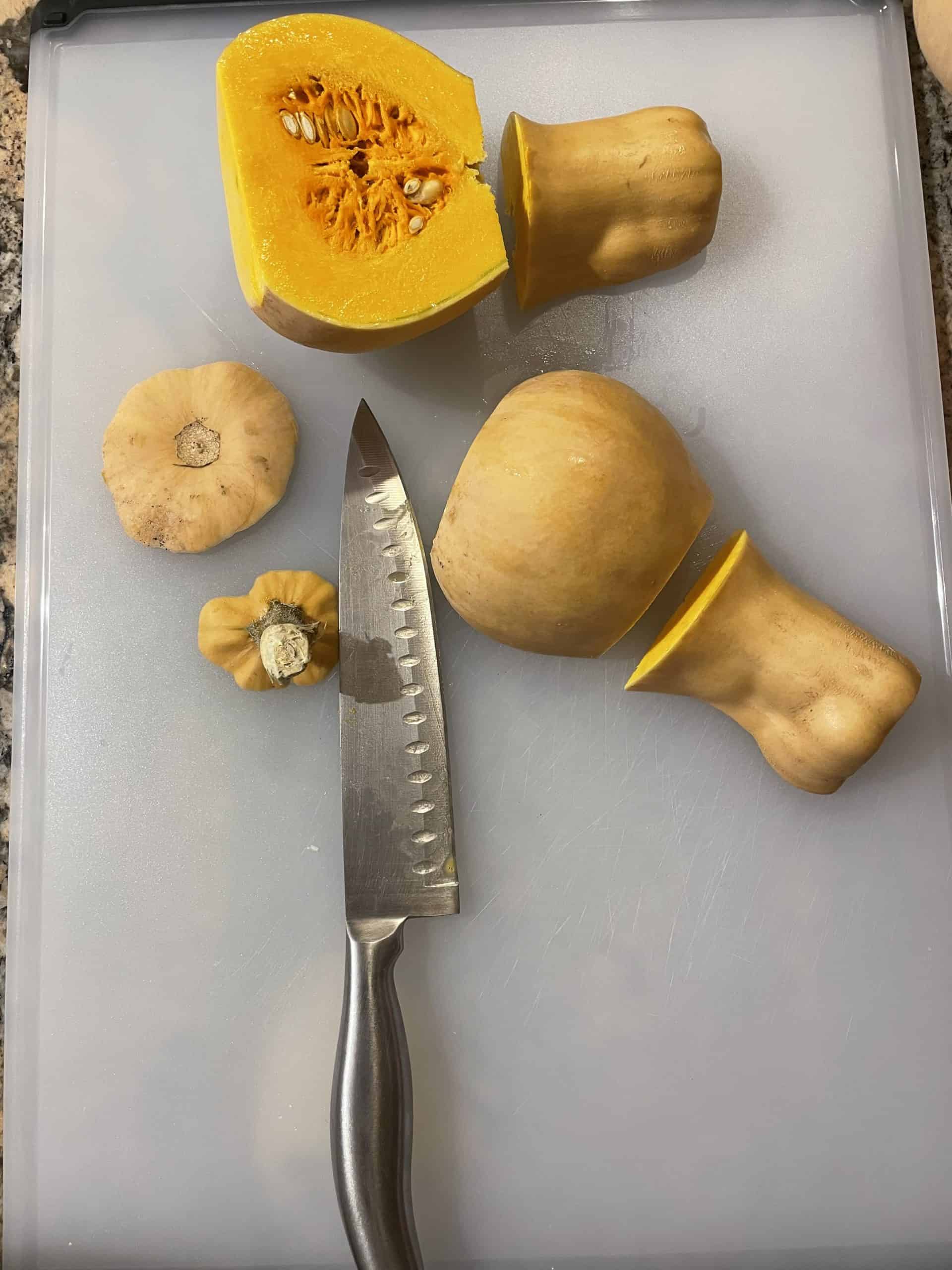 Cutting Butternut Squash into sections.