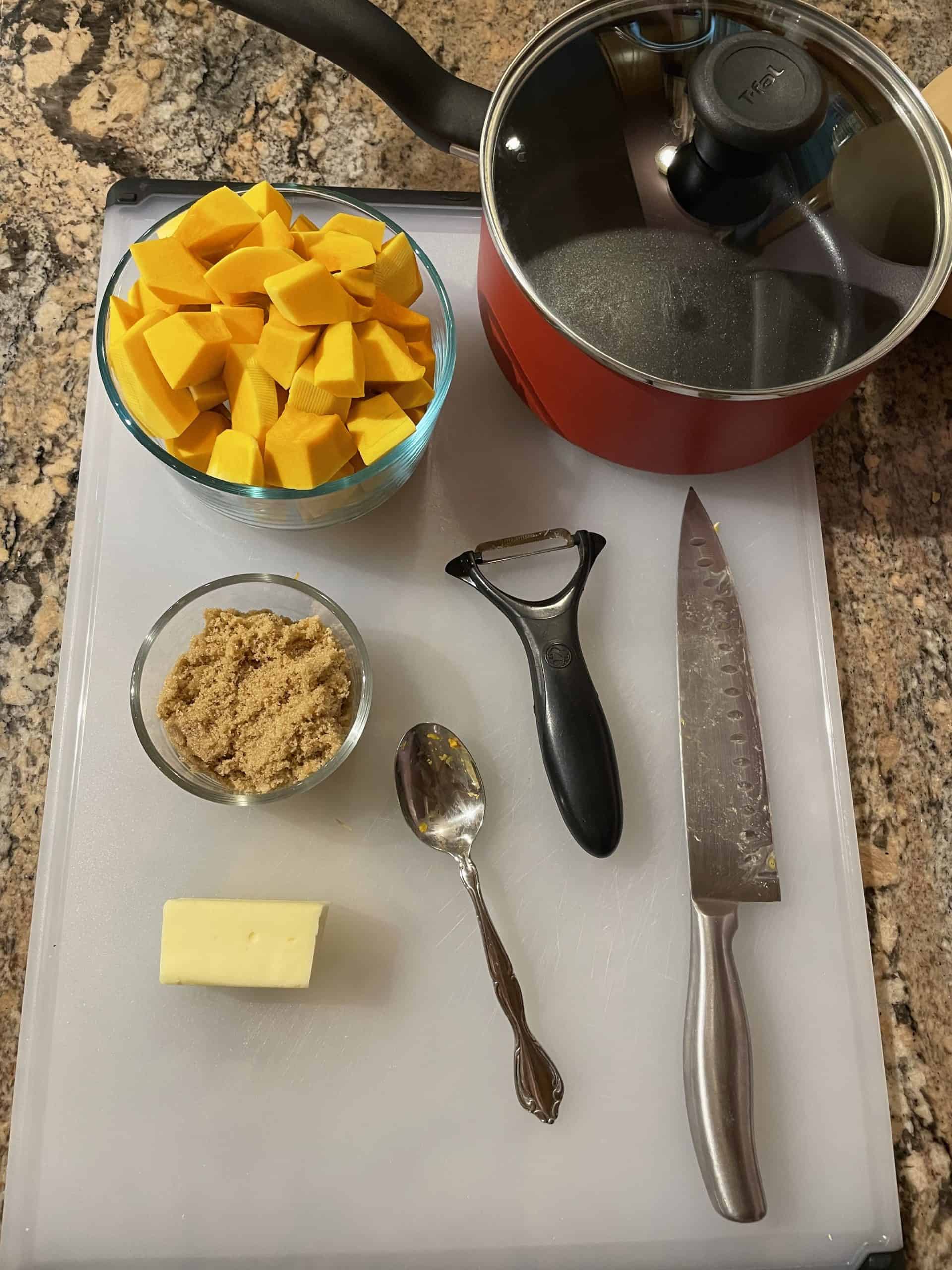 Mashed Butternut Squash ingredients - diced squash, brown sugar, butter and tools needed.