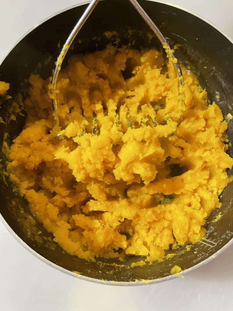 Combine all ingredients with a masher.