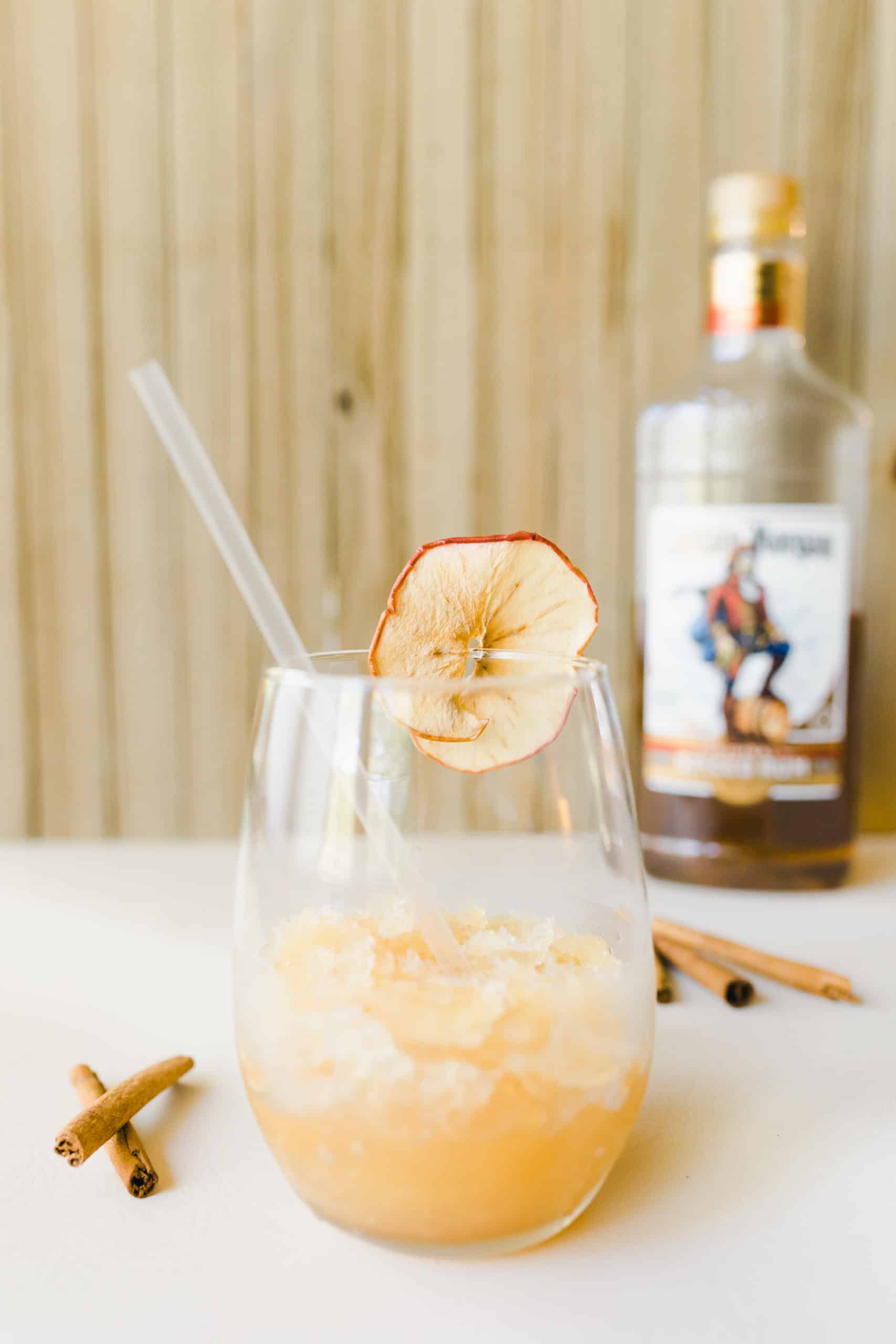 Captain Morgan Apple Cider Slush Cocktail with a dried apple garnish.