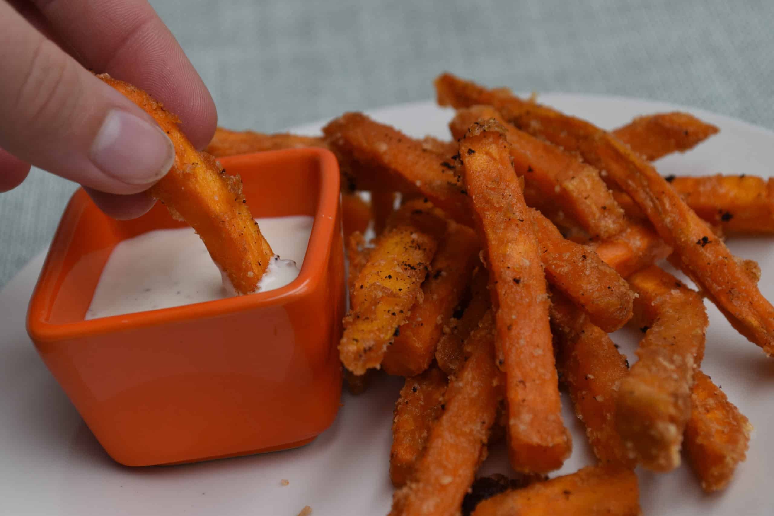 Alexia Sweet Potato Fries dipped in ranch dressing.