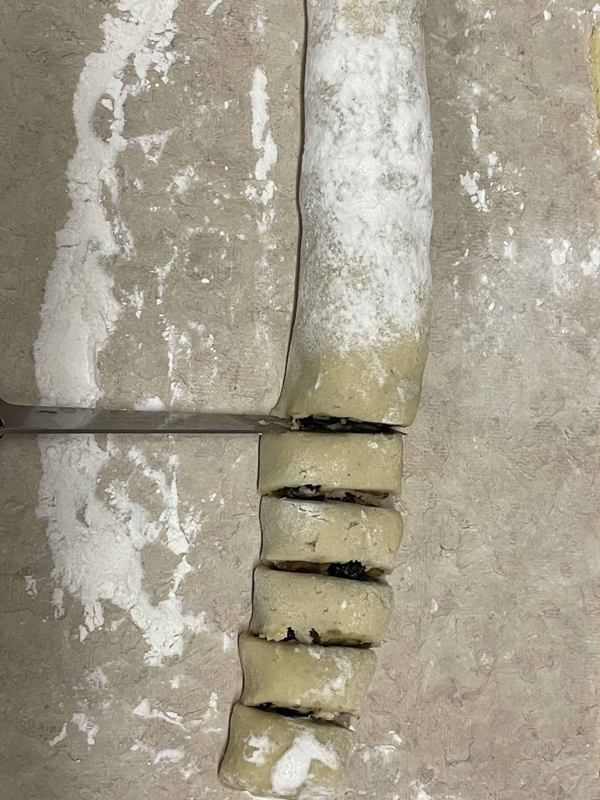 Cut the cookie dough log into 1 inch pieces.