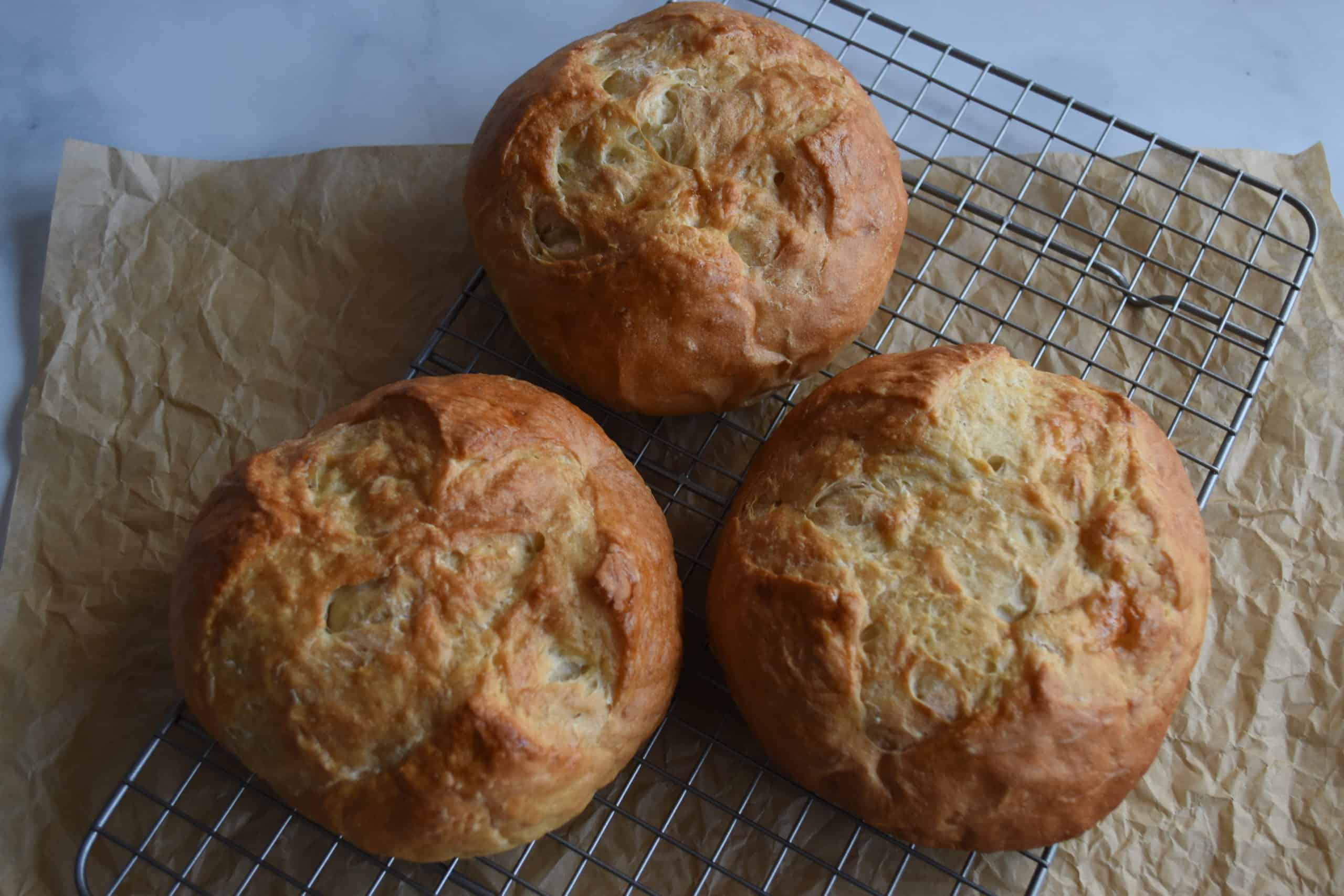 3- Bread Bowls on a wire cooling rack.