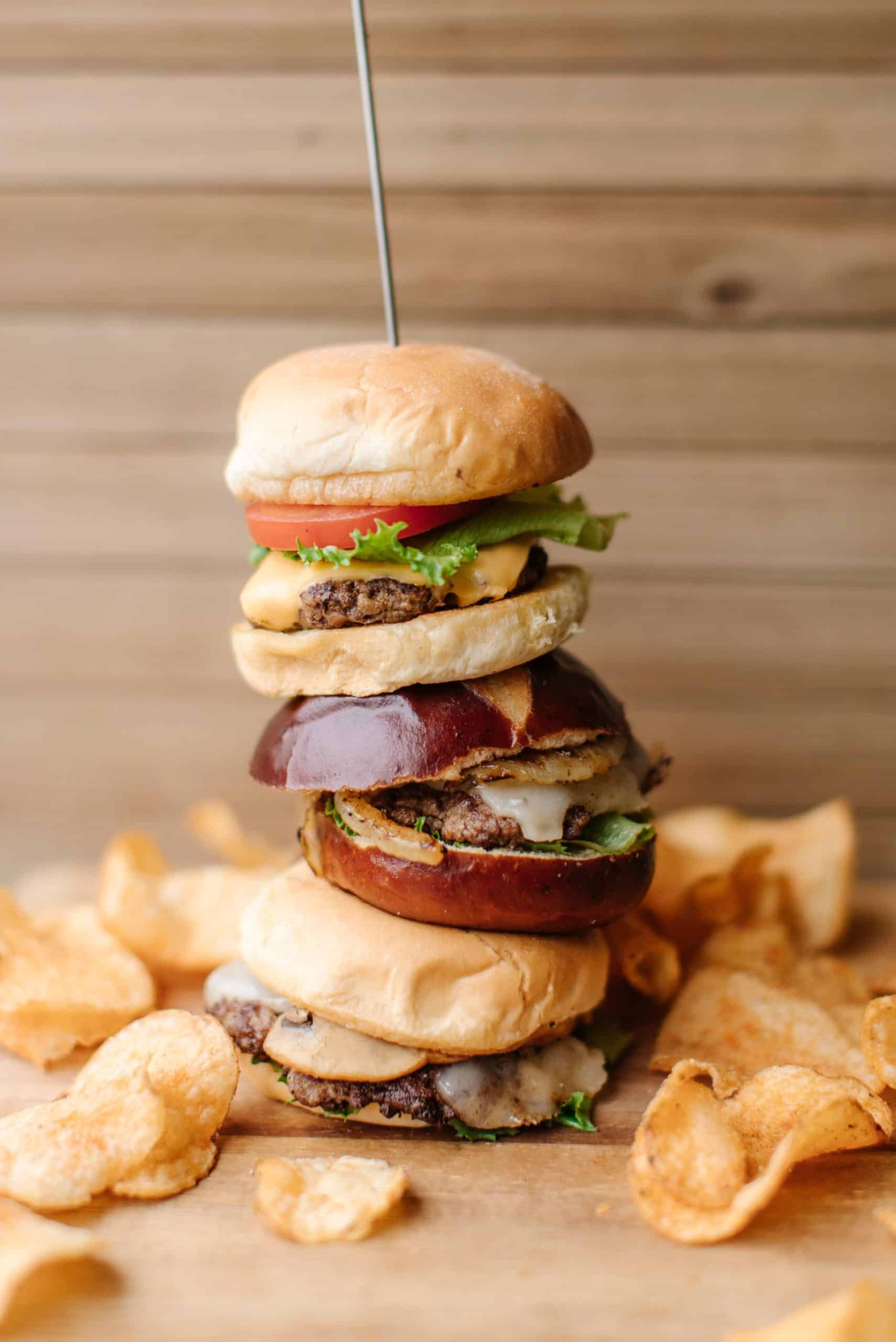 Smash Burger Tower Surrounded by Homemade Potato Chips.