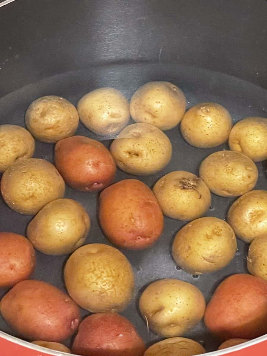 Boiling Baby Potatoes in a large pot.