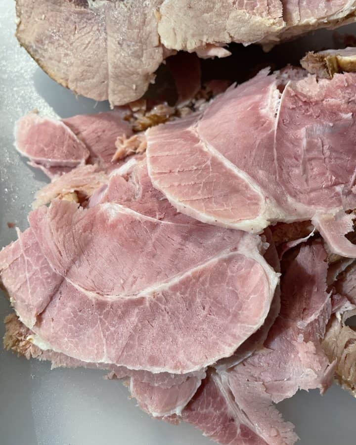 Easy Boil Ham - Sliced on a cutting board.