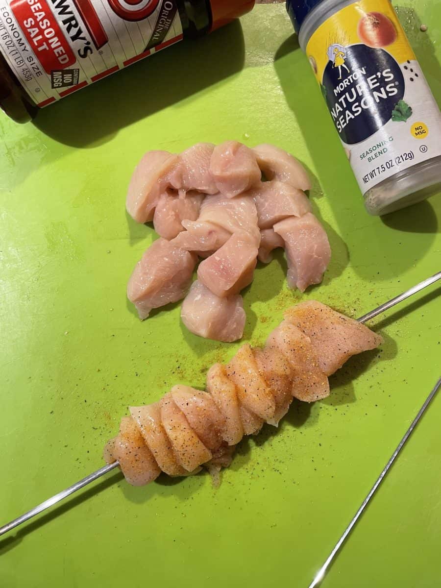Place Chicken Pieces onto Skewer and Season with your Favorite seasonings. (Lawyr's Seasoned Salt and Morton Natures Seasoning)