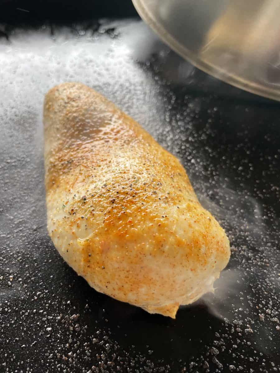 Cover Cooking Chicken Breast with a Dome Lid.