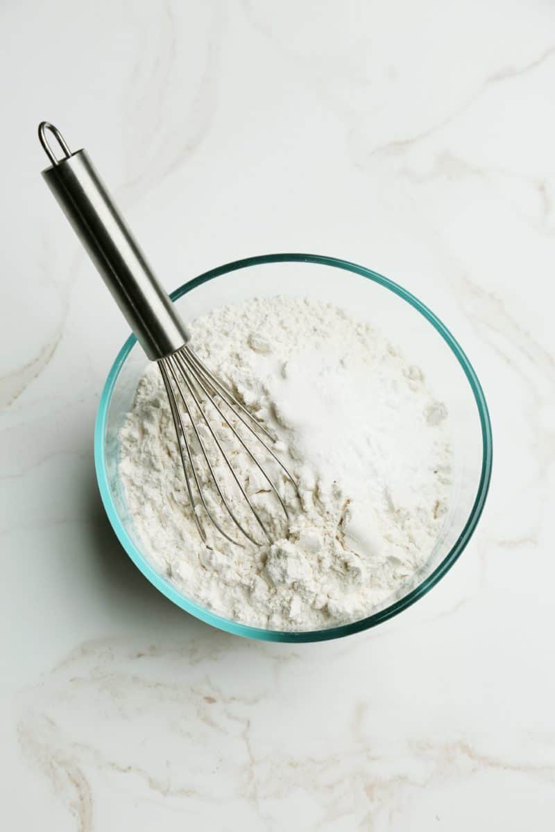 Combine the Flour, Baking Soda, and Salt together in a bowl with a whisk.