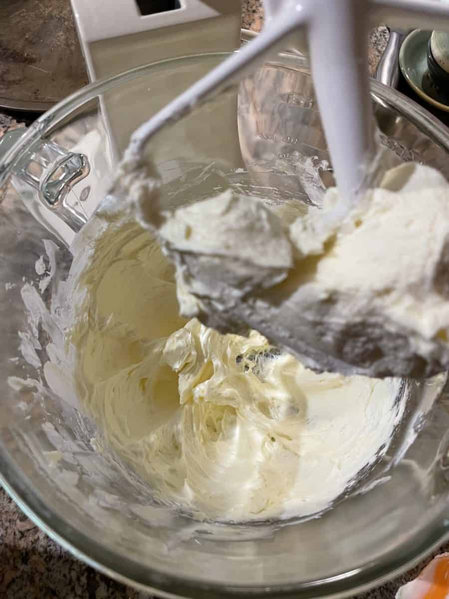 Creamed Softened Butter and Cream Cheese in a mixing bowl with a flat paddle.