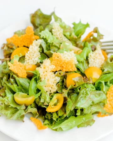 Cheese Crisps on Top of a Salad.