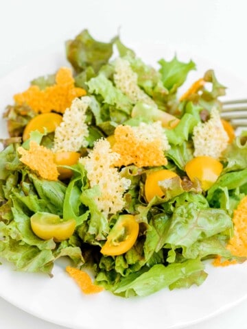 Cheese Crisps on Top of a Salad.