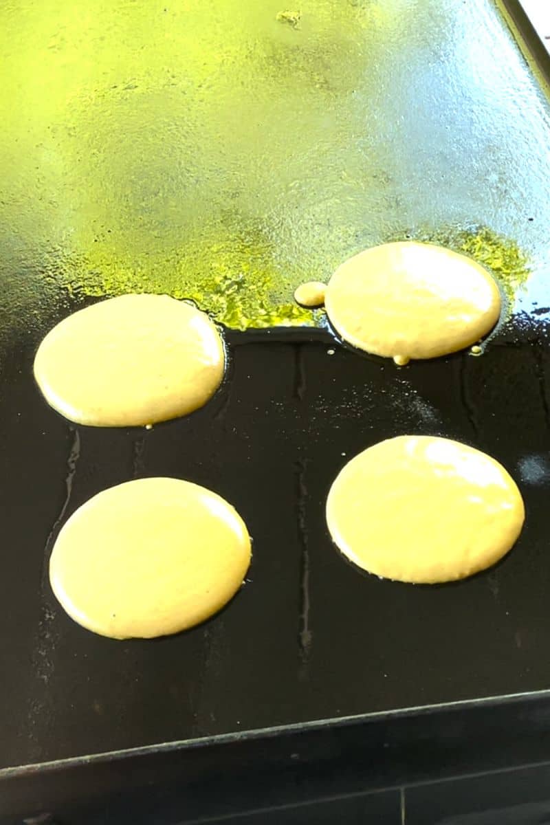 Pancakes cooking on a Blackstone Griddle.
