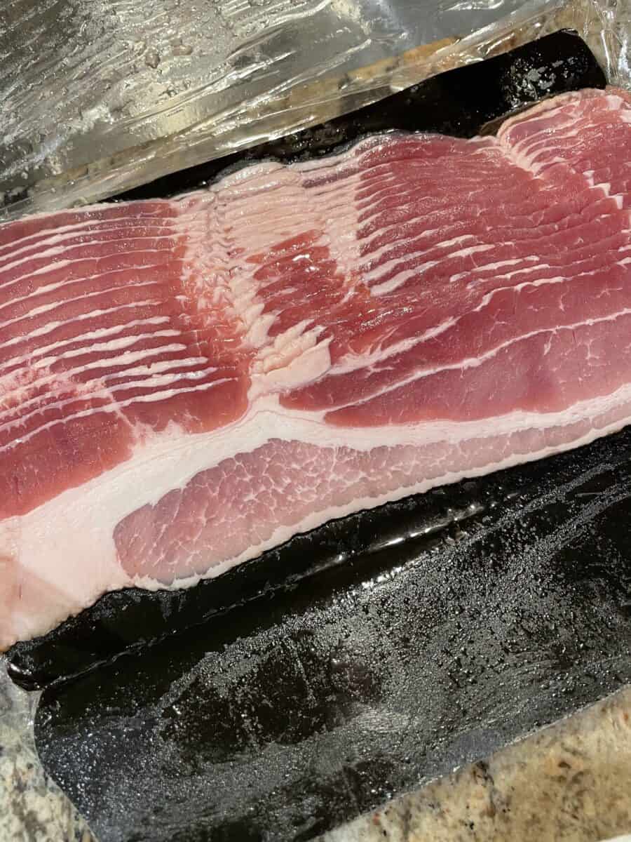 A pack of uncooked bacon.