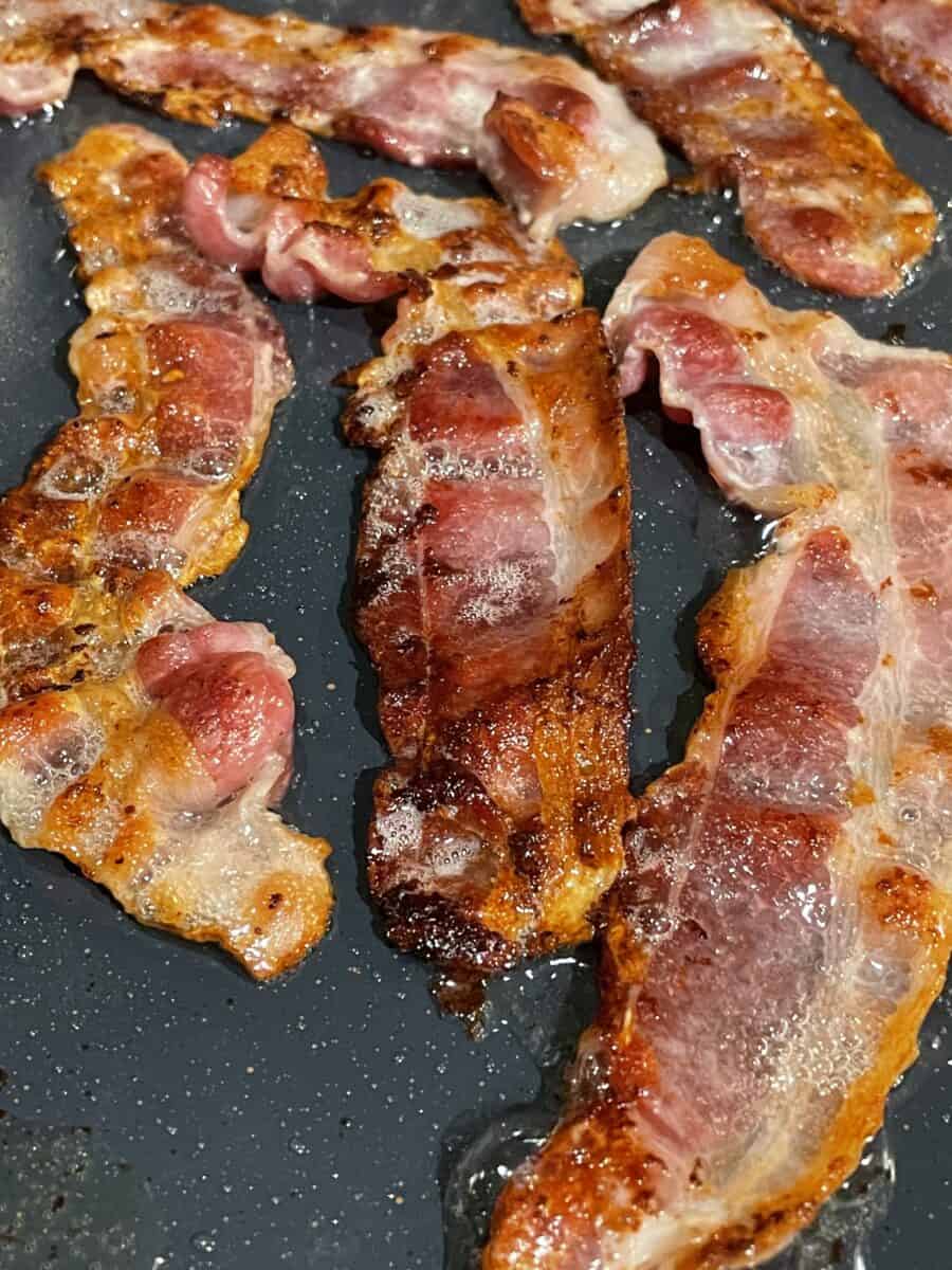 Cooking bacon on a Blackstone Griddle.
