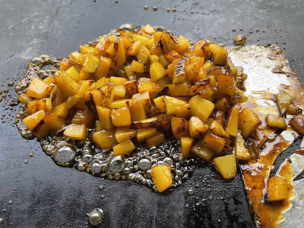 Caramelized Butternut Squash Recipe cooking on a Blackstone Griddle.