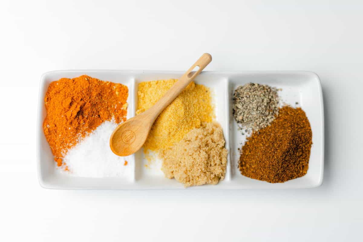 BBQ Dry Rub Ingredients - Paprika, chili powder, brown sugar, salt, black pepper, and granulated garlic.