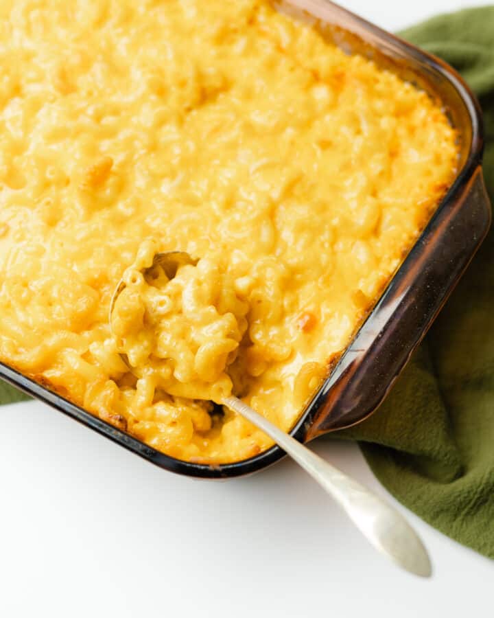 Smoked Mac and Cheese in a baking dish with a serving spoon.