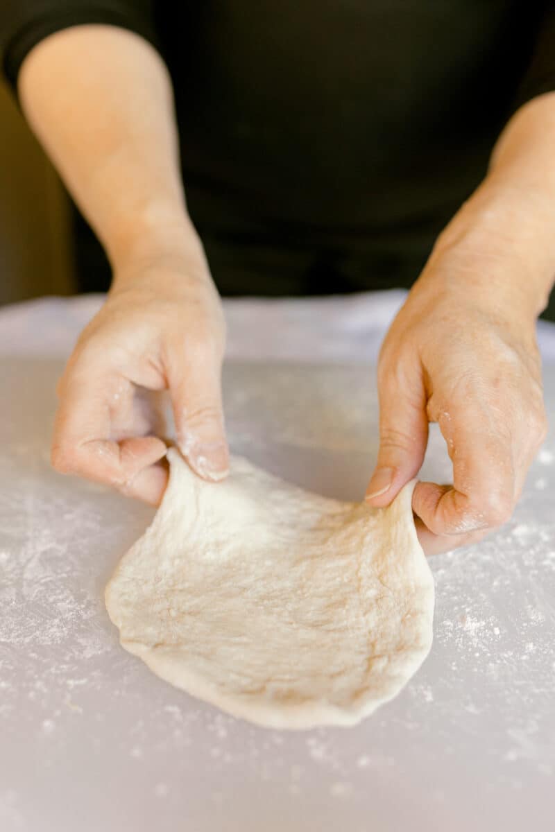 Pressing Out Pizza Crust.