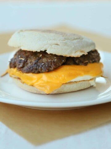 Sausage Egg and Cheese McMuffin on a Plate.