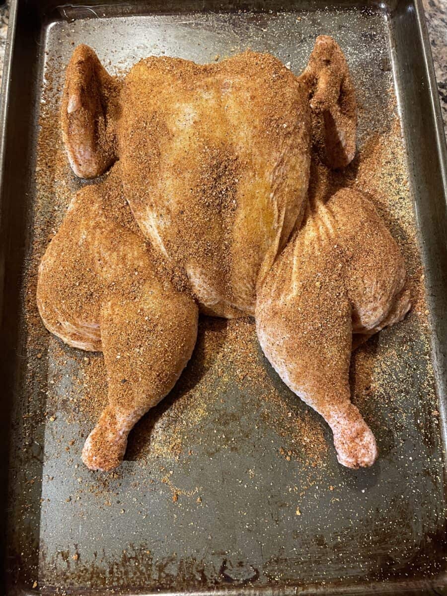 Season the Whole Chicken on both sides.