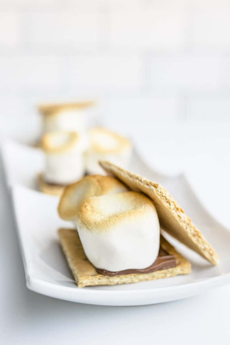 Freshly Made Oven Smores Lined Up on a Serving Tray.