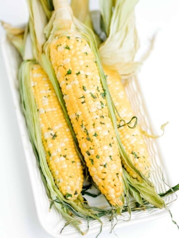 Smoked Corn on the Cob on a plate.