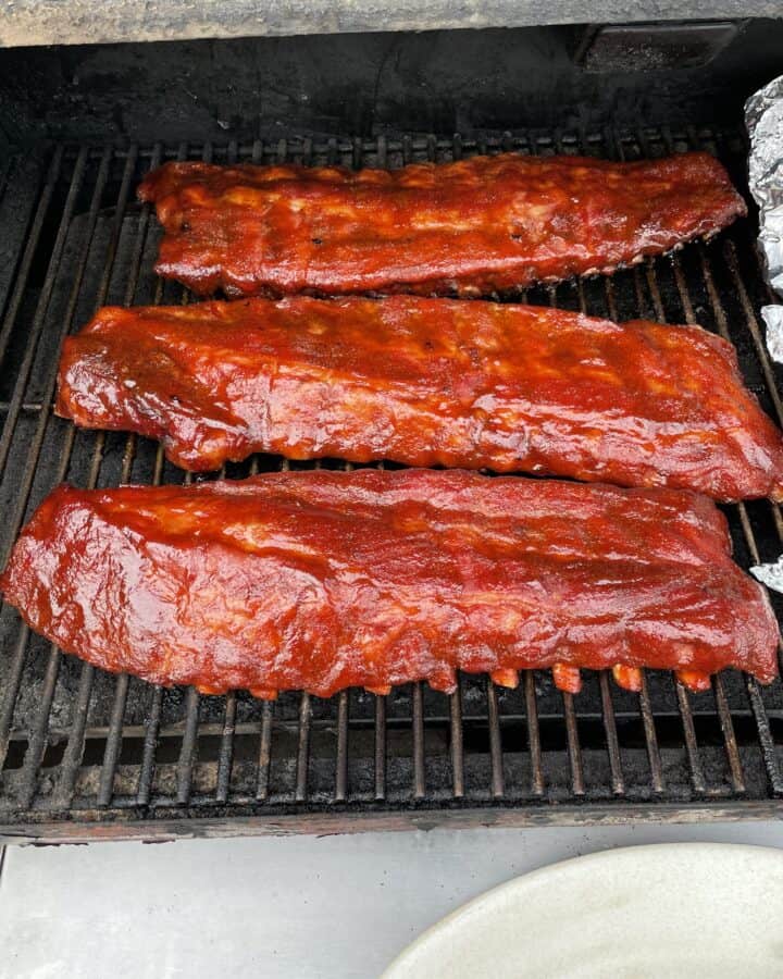Smoked Baby Back Ribs with BBQ Sauce on a Smoker RecTeq Grill.