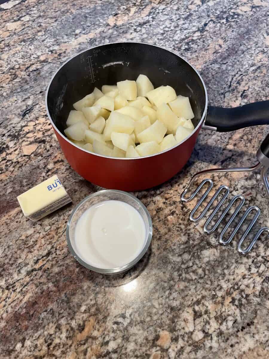Mashed Potato Ingredients - Boiled Potatoes, Milk, and Butter.