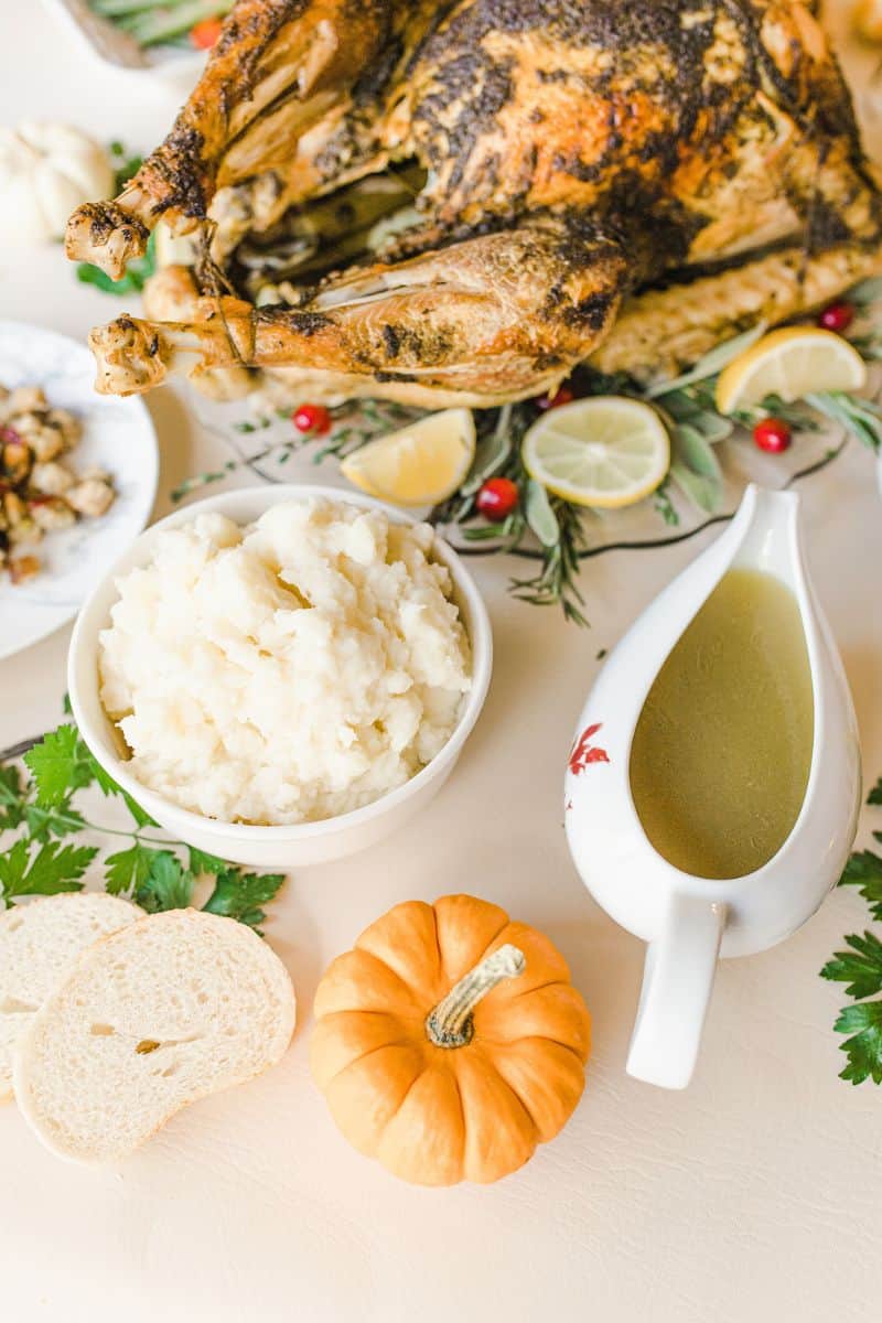 Thanksgiving Dinner Table with Mashed Potatoes, Turkey and Gravy