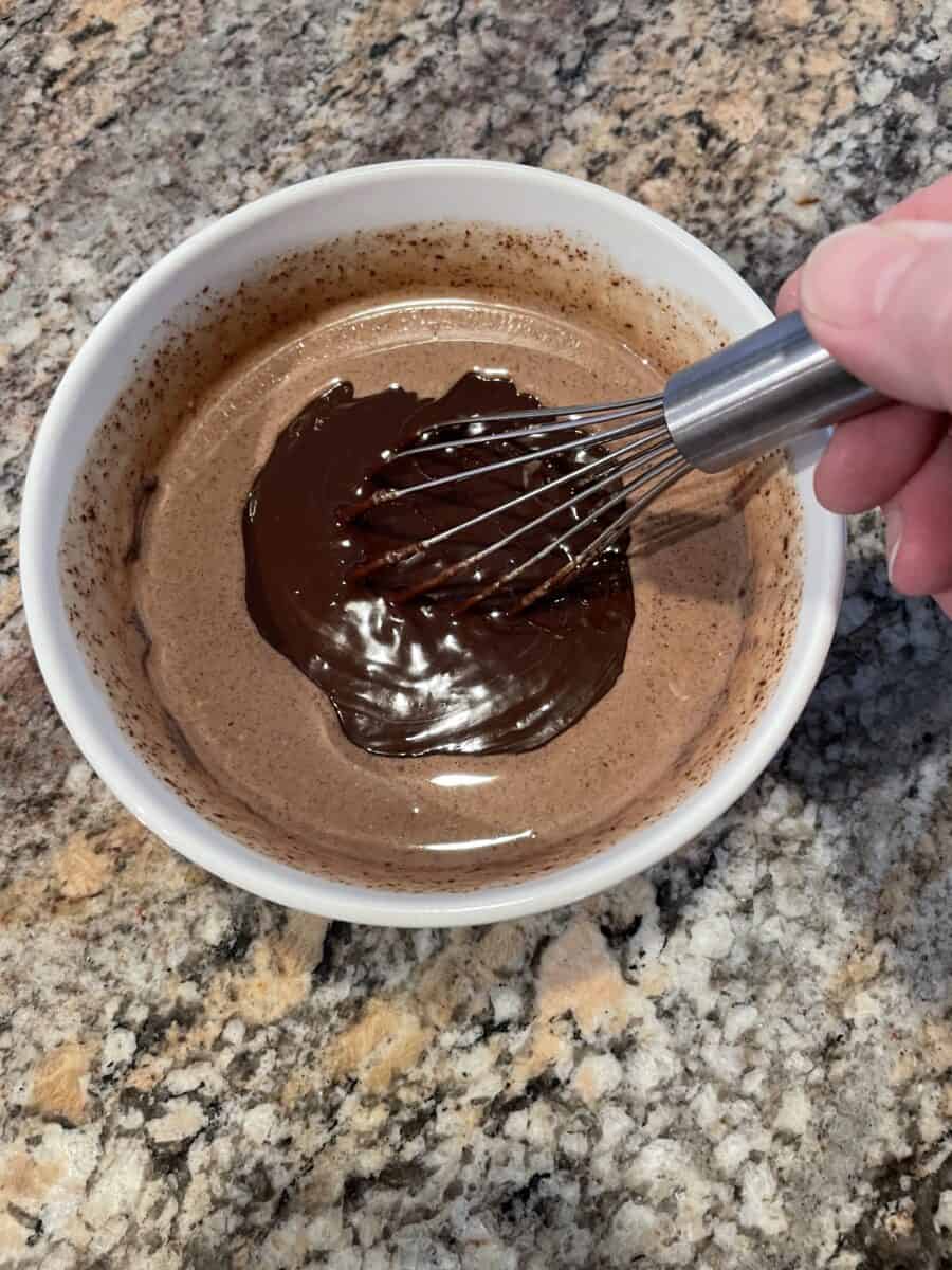 Second Stage of Whipping Together Chocolate Ganache in a Bowl.
