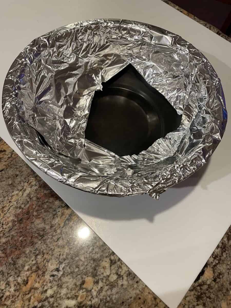 A Drip Pan Wrapped in Foil for a Brinkmann Smoker Grill.
