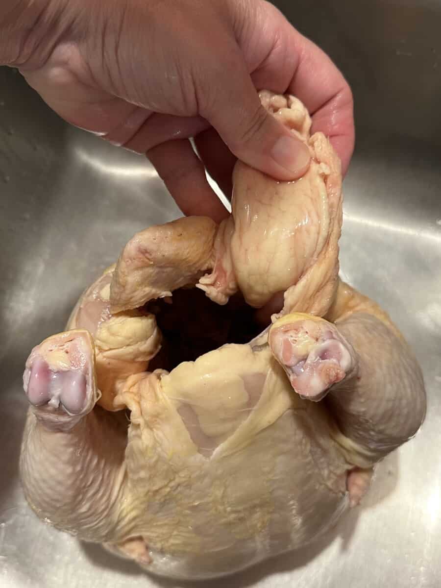 Cut Off Excess Fat from inside Chicken
