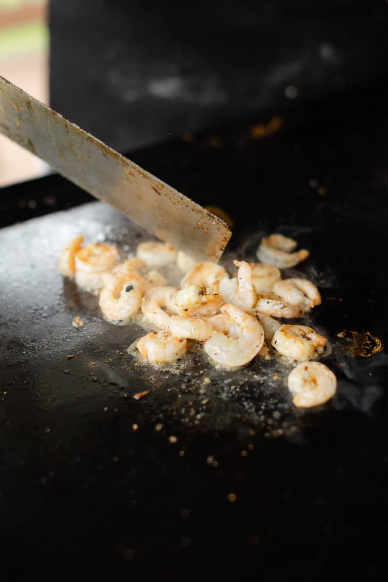 Flipping the Hibachi Shrimp Half Way Through Cooking