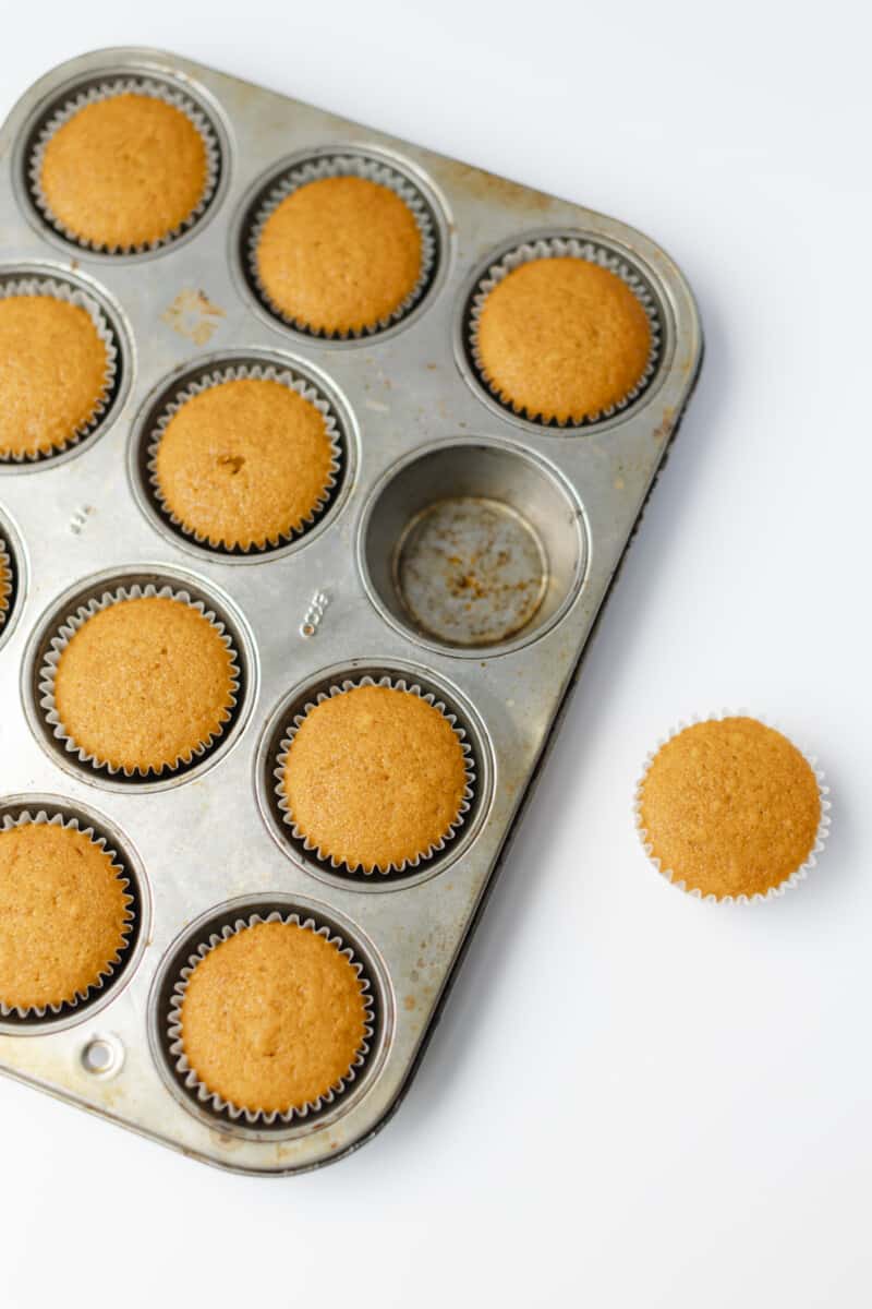Baked Pumpkin Cupcakes Recipe in a Muffin Tin.