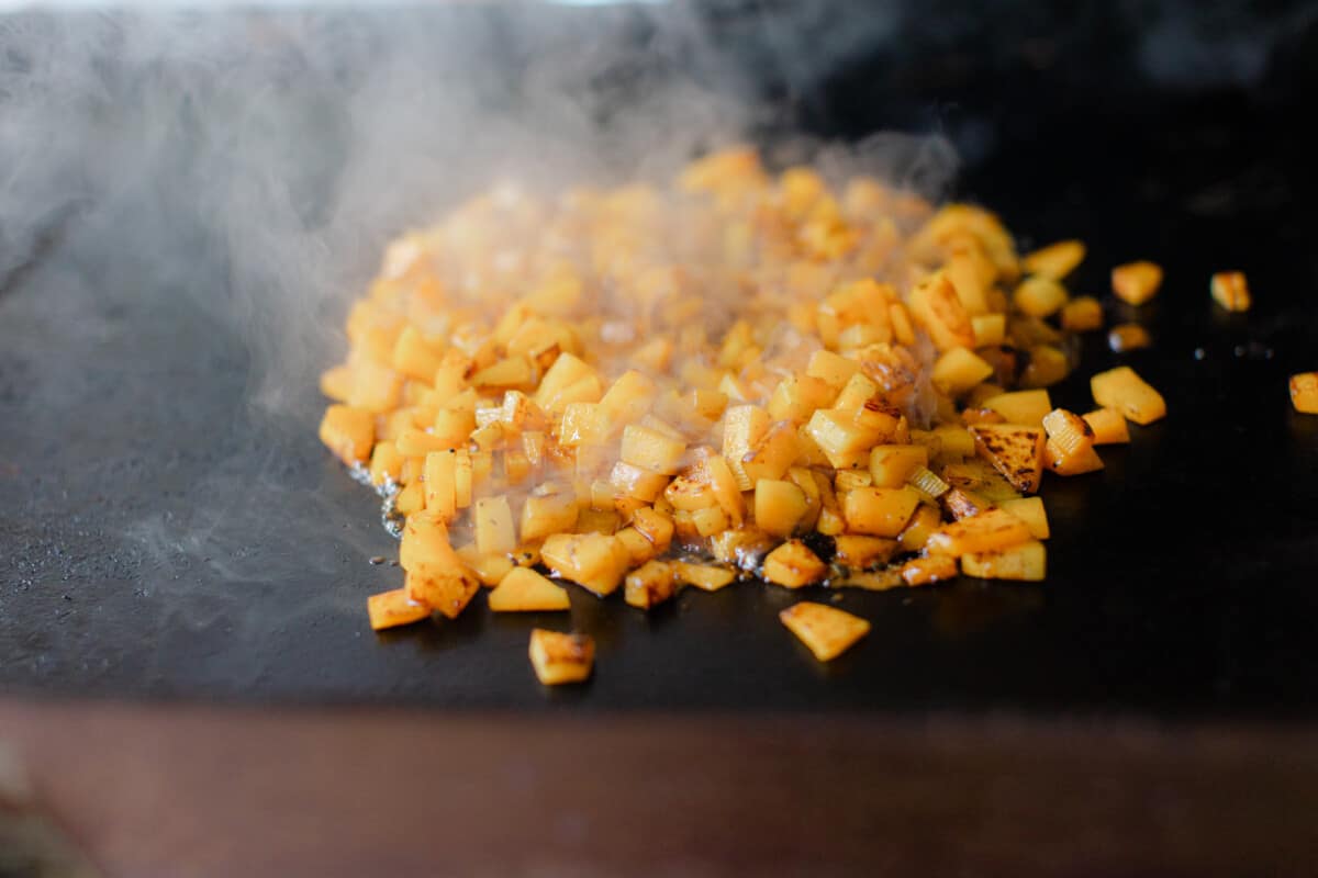 Caramelized Butternut Squash Cooking on a Blackstone Griddle