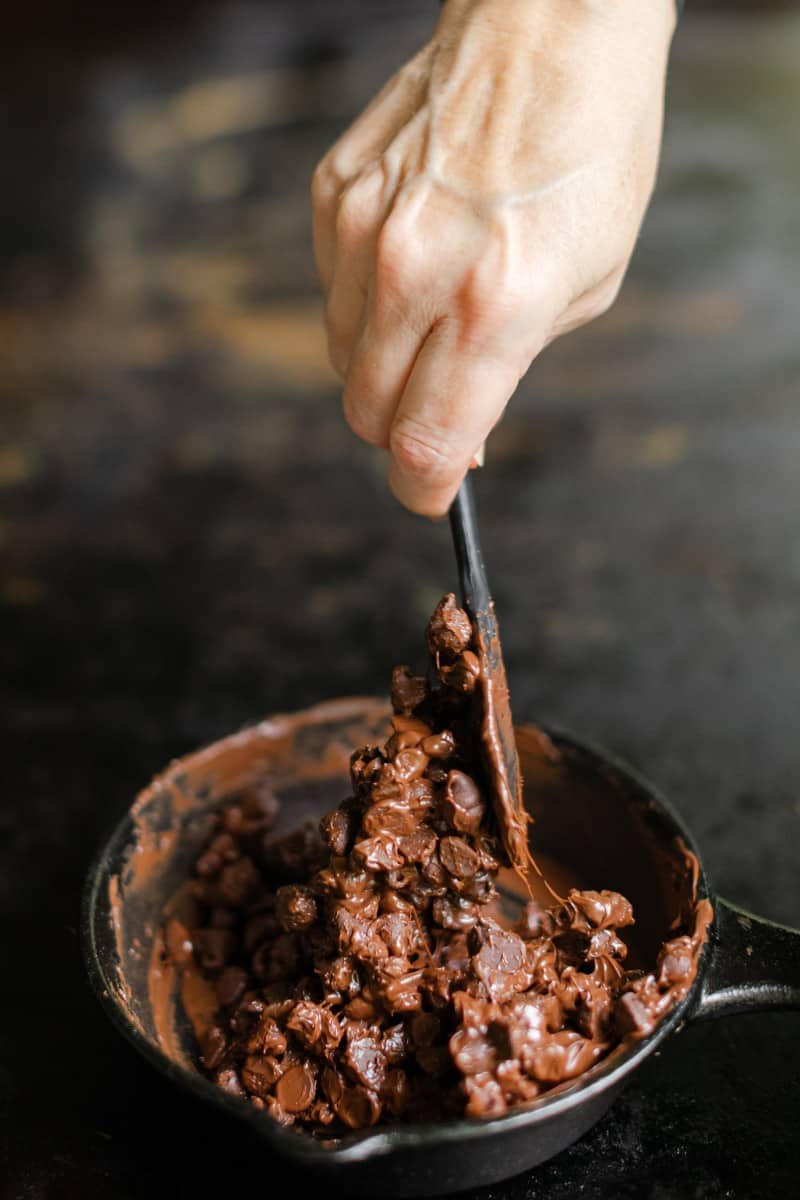 Stirring Melting Chocolate Chips in a Cast Iron Pan