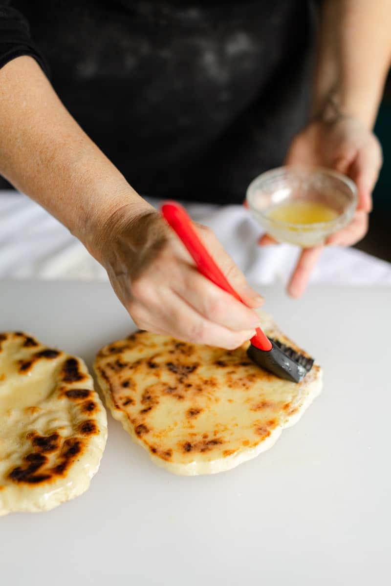 Butter the Cooked Naan Bread