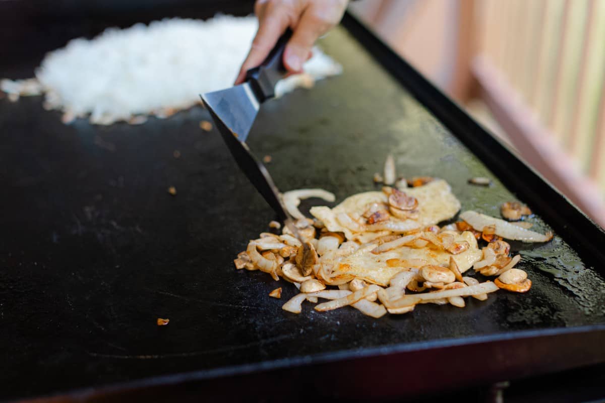 Flipping Mushrooms and Onions with a Griddle Spatula