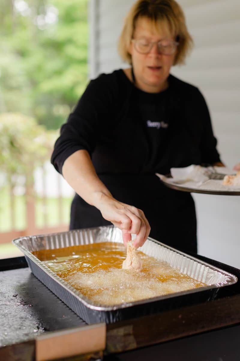 Chef Sherry Ronning Deep Frying Chicken Wings on a Blackstone Griddle